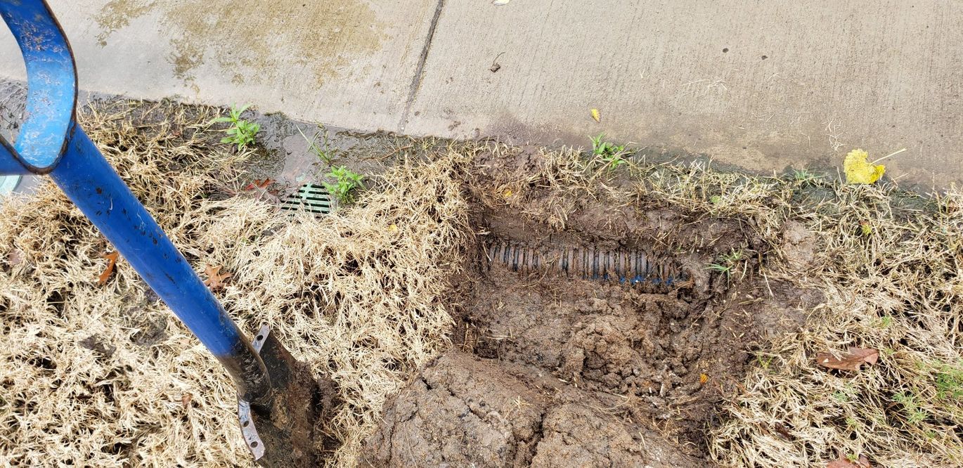 Grading — Blue Shovel Used For Digging Drainage in Wichita, KS