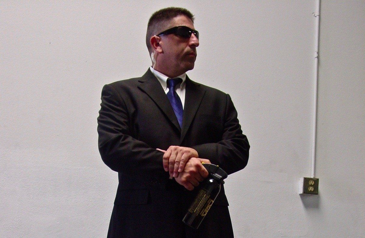 Body Guard Wearing Black Suit — Sand Pedro, CA — Delta Bravo Group Body Guard Wearing Black Suit — Sand Pedro, CA — Delta Bravo Group