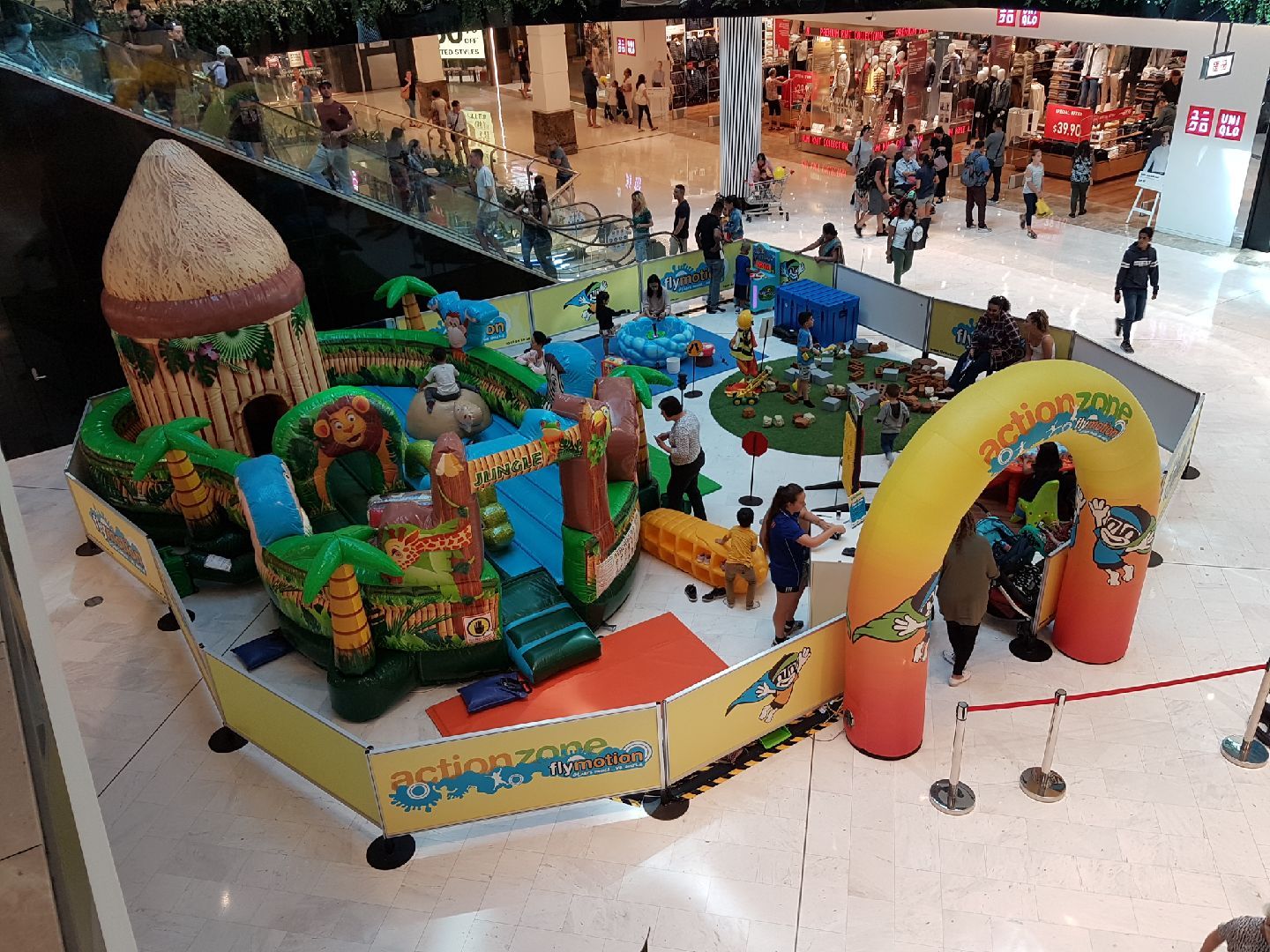 young boy playing at the action zone