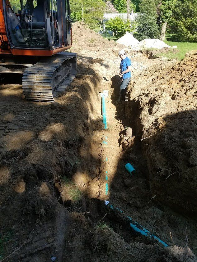Installing Septic Sewer Tank Container — Saunderstown, RI — Briggs Septic, Inc.