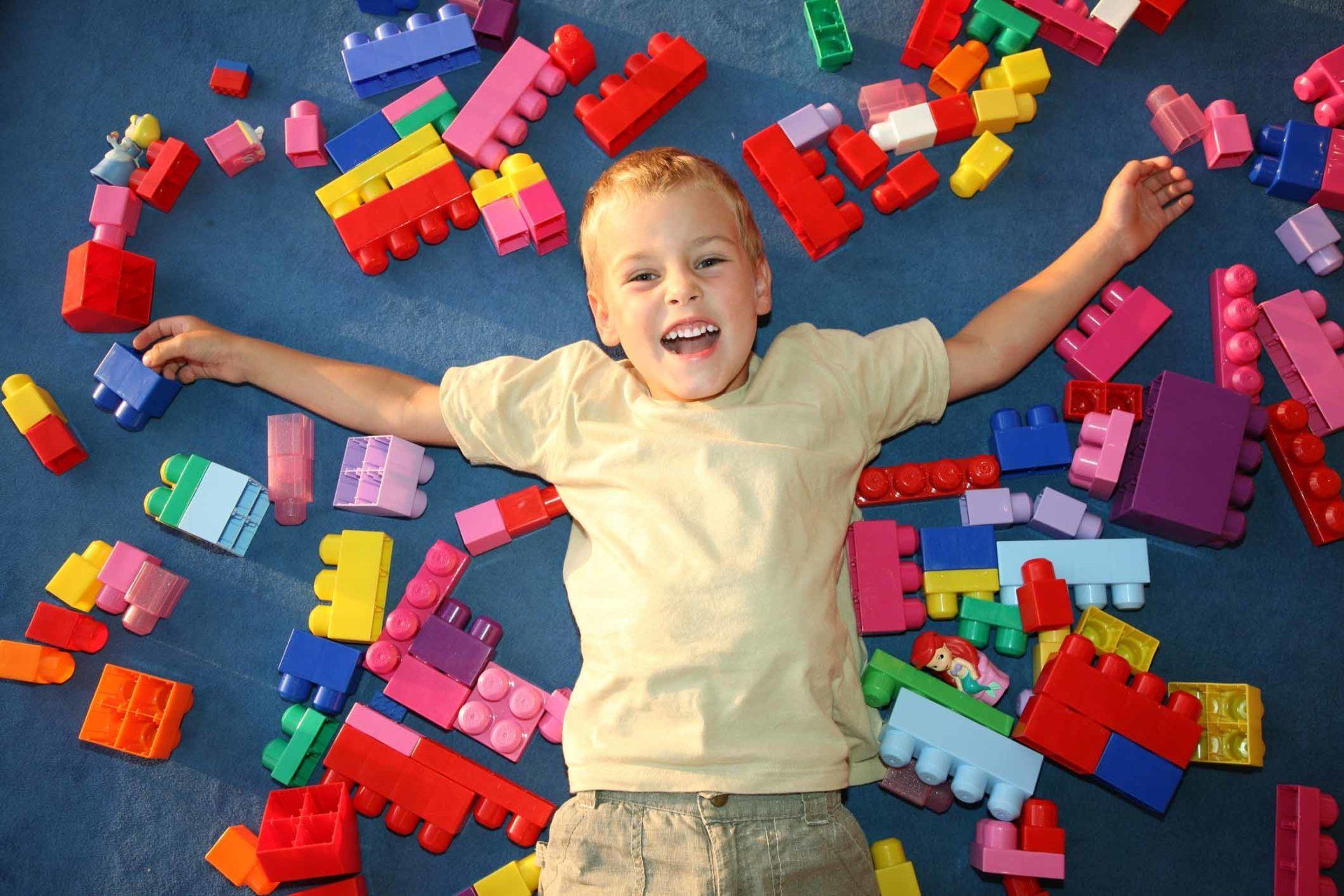 Child playing with legos — Programs in Westminster, CO Child playing with legos — Programs in Westminster, CO