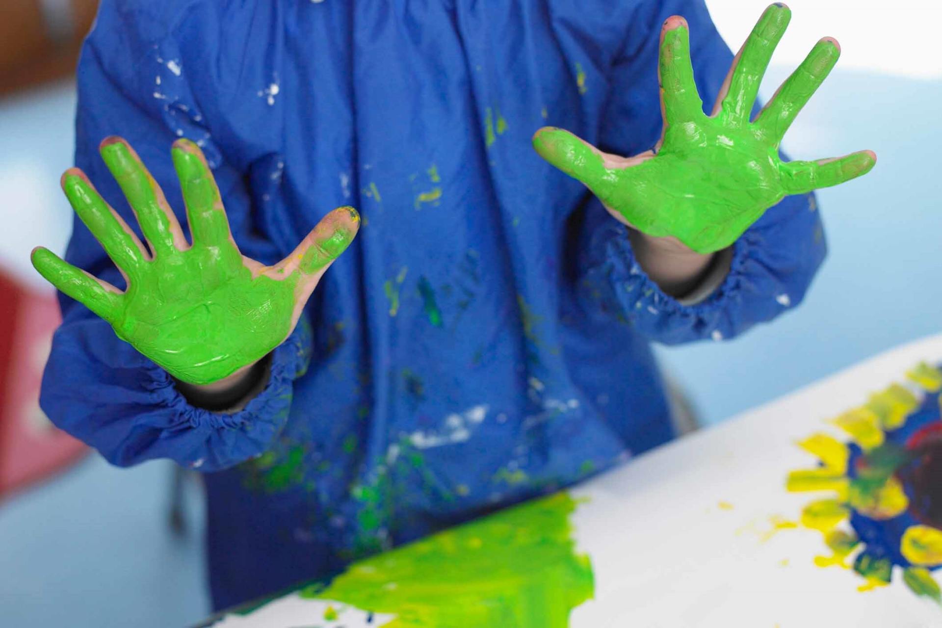 Child playing with paint — Programs in Westminster, CO Child playing with paint — Programs in Westminster, CO