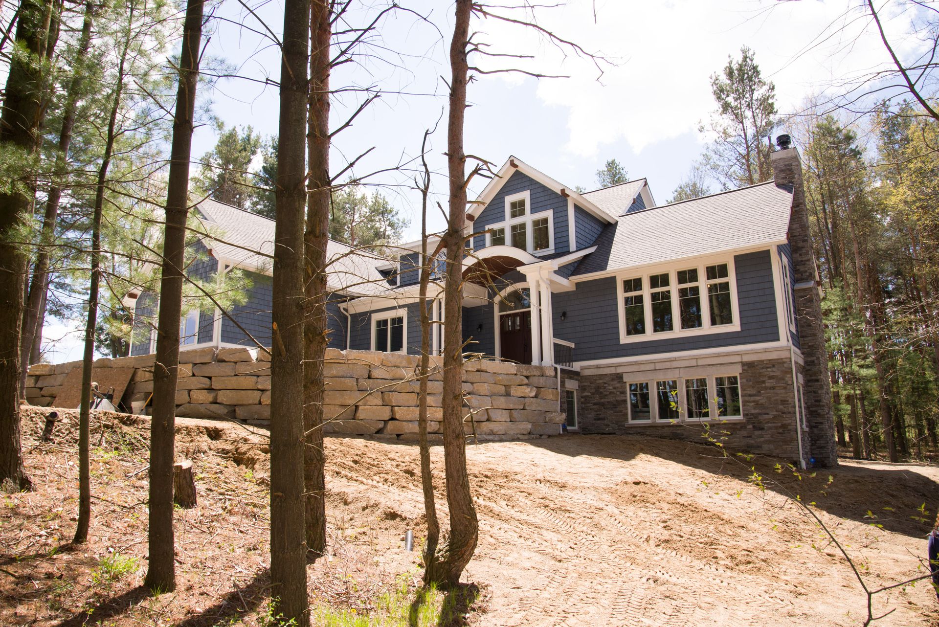 A large house in the middle of a forest