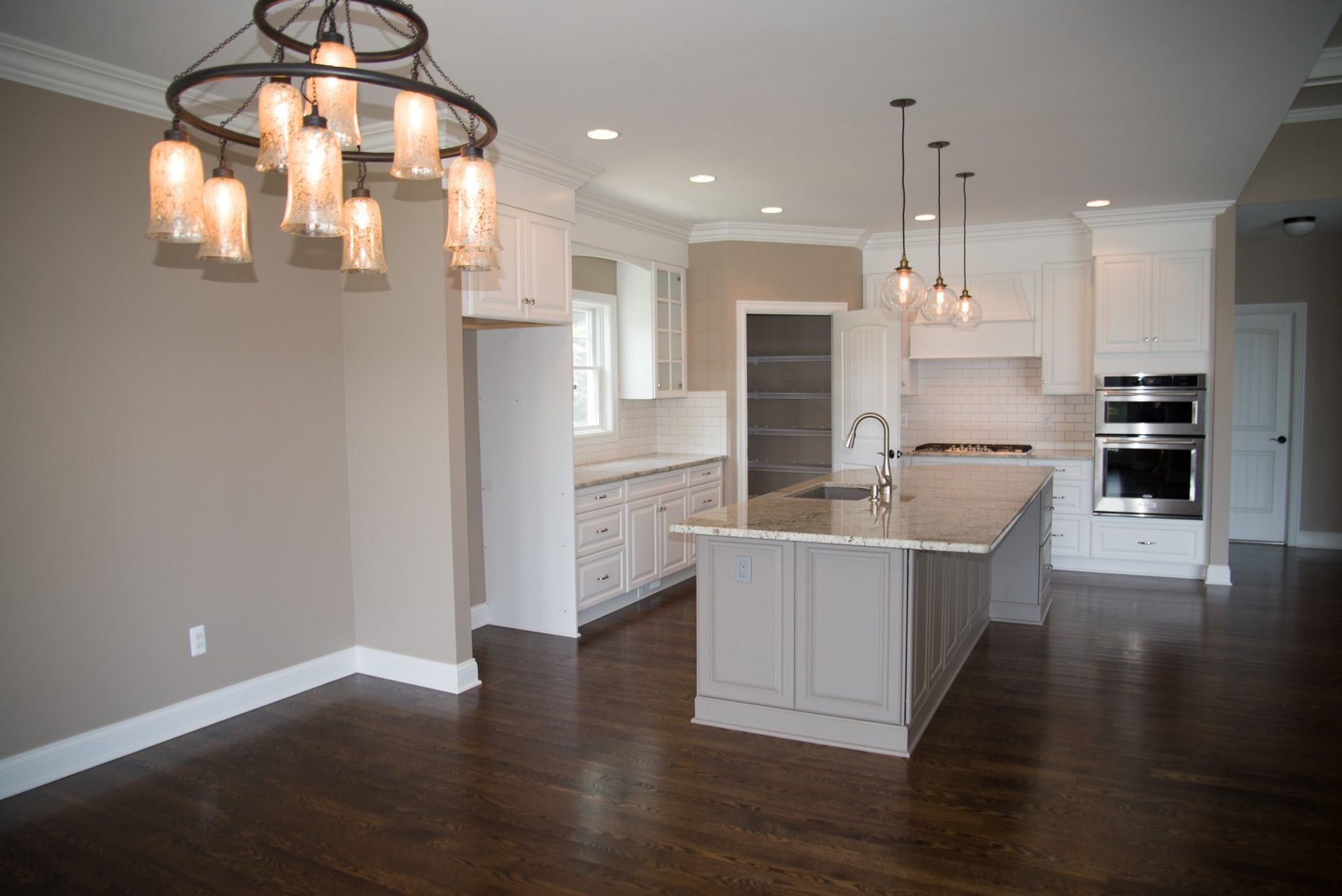 There is a large island in the middle of the kitchen.