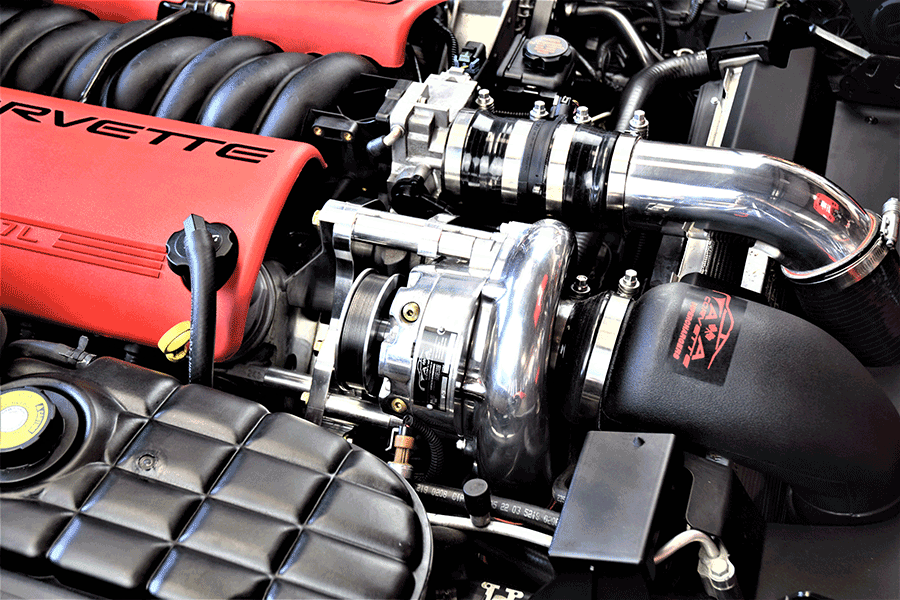 Under hood of corvette with supercharger