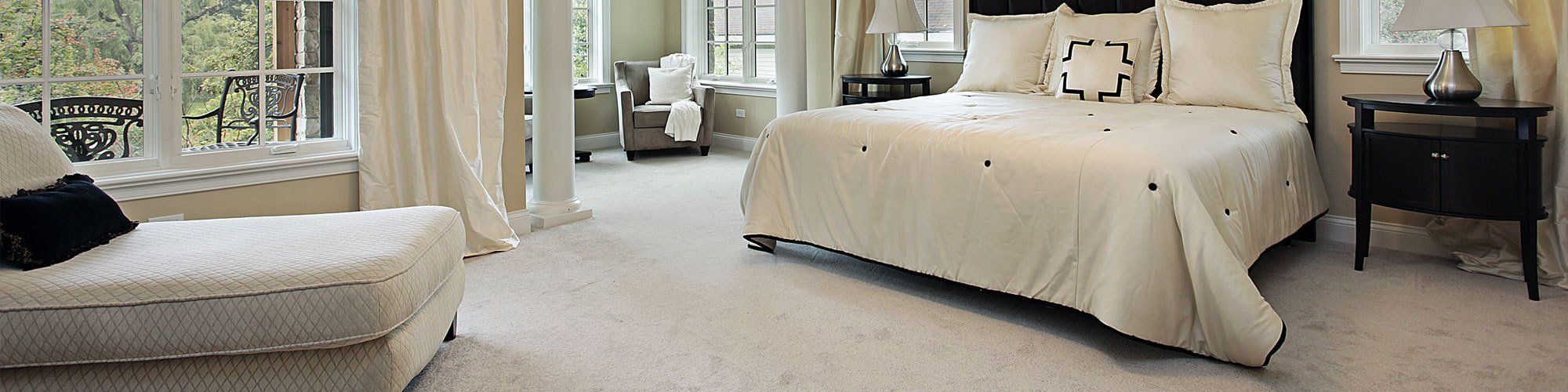 Bedroom with white carpet