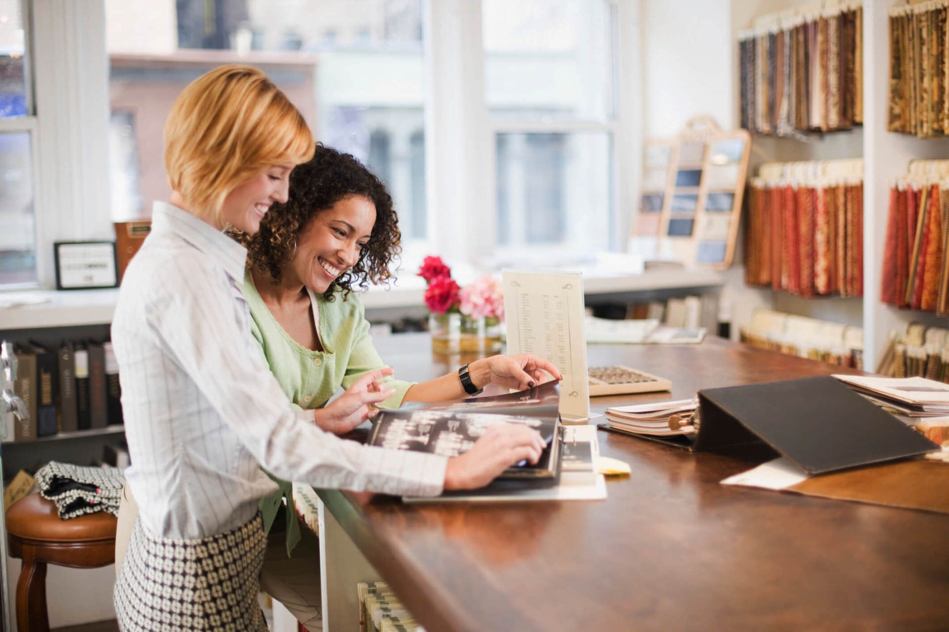 Women choosing carpet design — Carpet Showroom in Bremerton WA