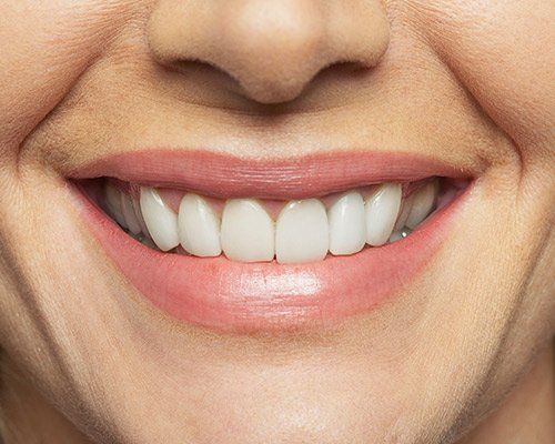 A closer look of woman smiling