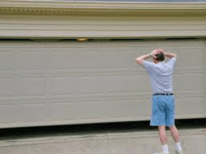 Man In Front Of Garage Door — Garage Doors in Port Macquarie, NSW Man In Front Of Garage Door — Garage Doors in Port Macquarie, NSW