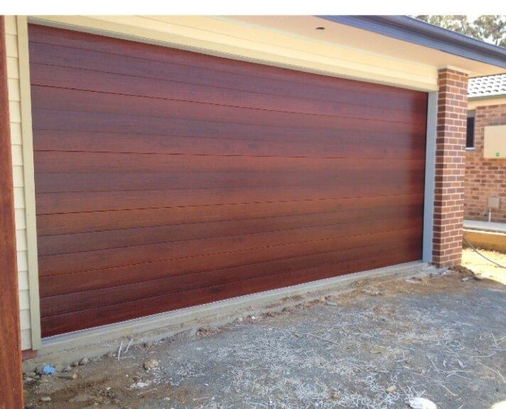 Speciality Panelift Door In Jarrah Finish — Garage Doors in Port Macquarie, NSW