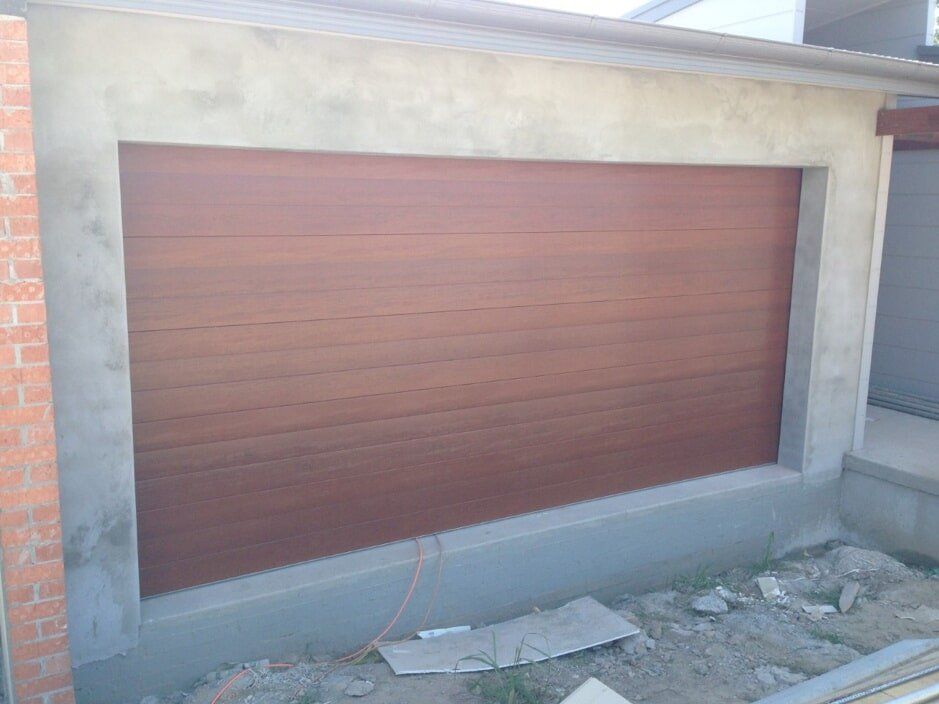 Timbalook Panelift Door in Merbau Colour — Garage Doors in Port Macquarie, NSW