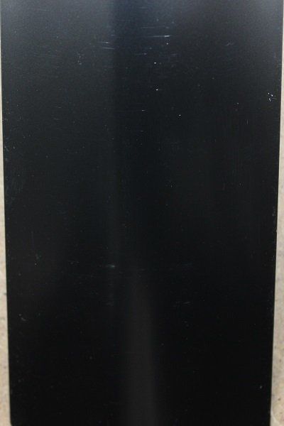 A close up of a black box on a table.