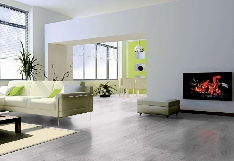 A living room with a fireplace and a couch