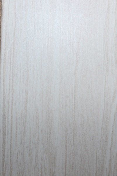 A close up of a piece of white wood.