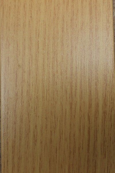 A close up of a piece of wood with a grainy texture.
