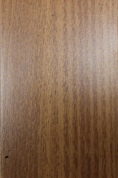 A close up of a piece of wood showing the grain and texture.