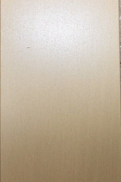 A close up of a piece of cardboard on a wall.