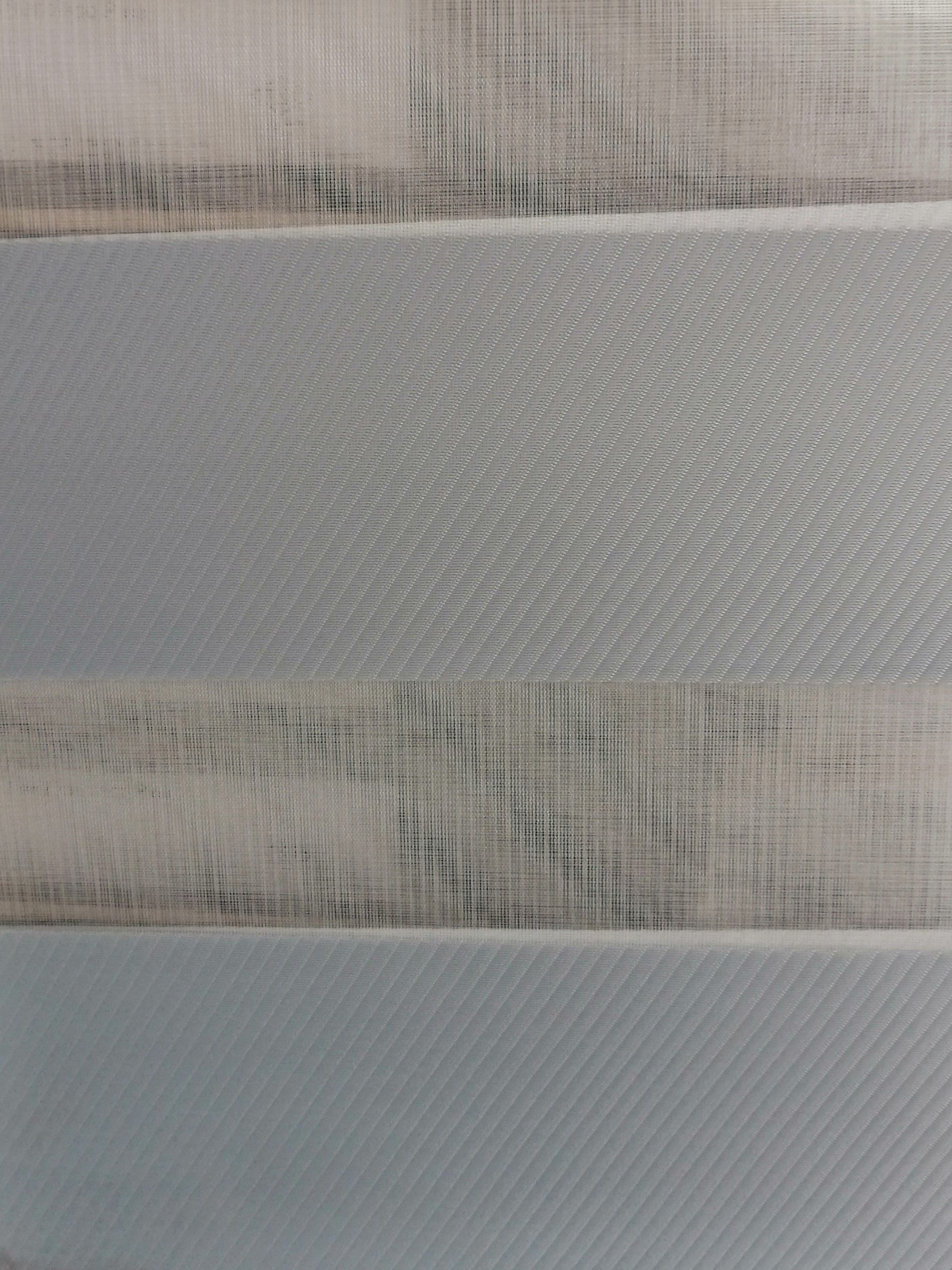 A close up of a piece of plastic sitting on top of a table.