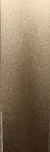 A close up of a piece of paper with a grainy texture.