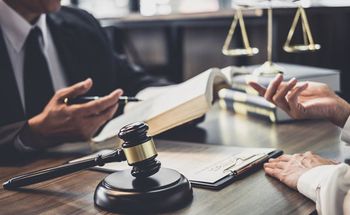 lawyer desk with gavel and scale