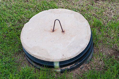 Septic Tank Lid In Yard