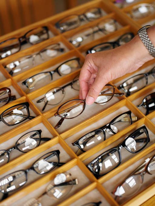 Man Choosing Eye Glasses - Eye Glasses in Greenwood, IN Man Choosing Eye Glasses - Eye Glasses in Greenwood, IN