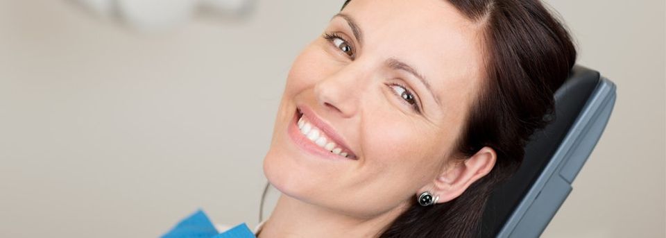 Woman sitting in dental chair