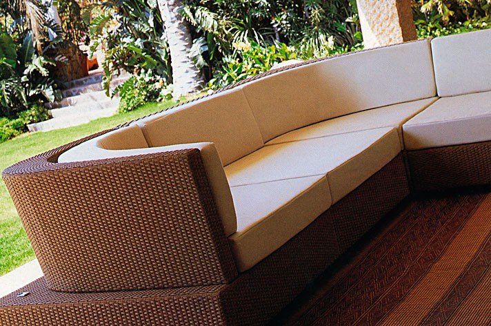 outdoor corner sofa with beige cushions