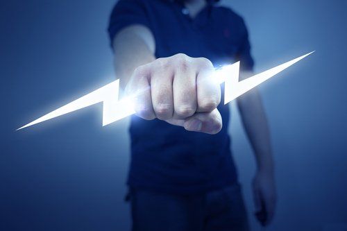 Man holding icon for electricity