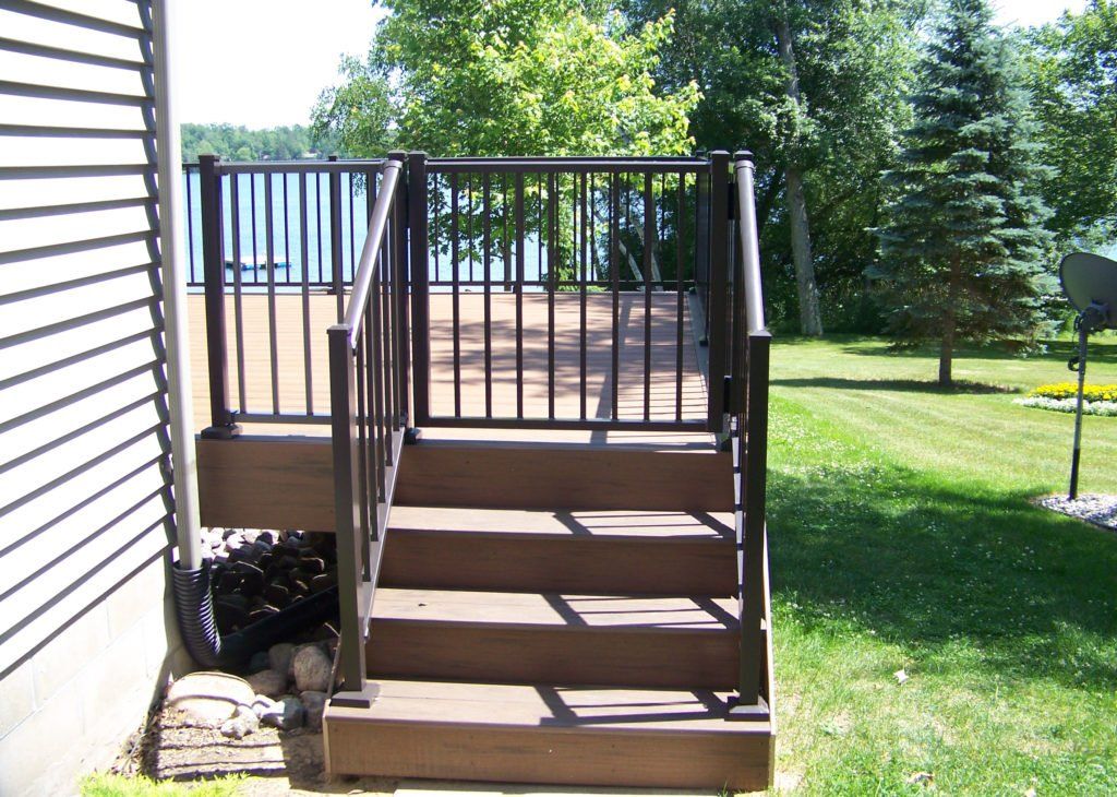 House with small deck and railing