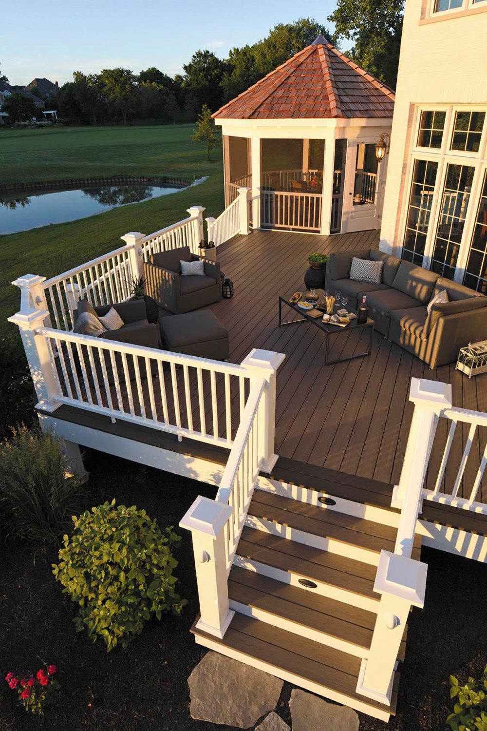An aerial view of a large deck with a gazebo in the background.