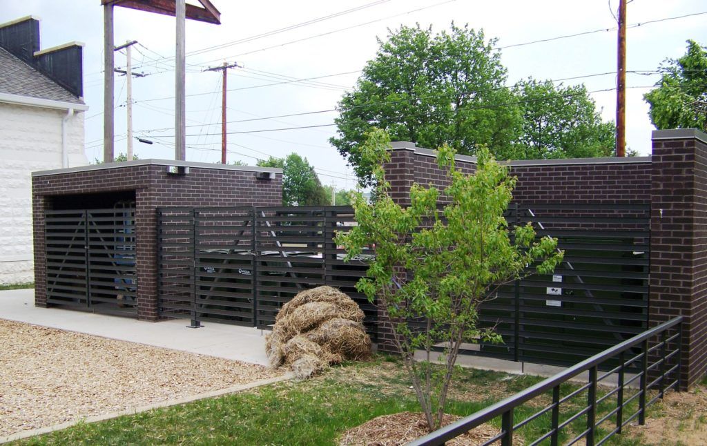 A brick building with a gate