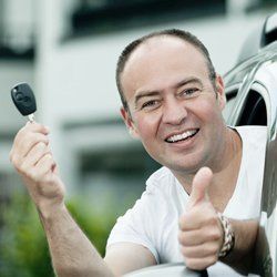 A man happy to get his driving licence