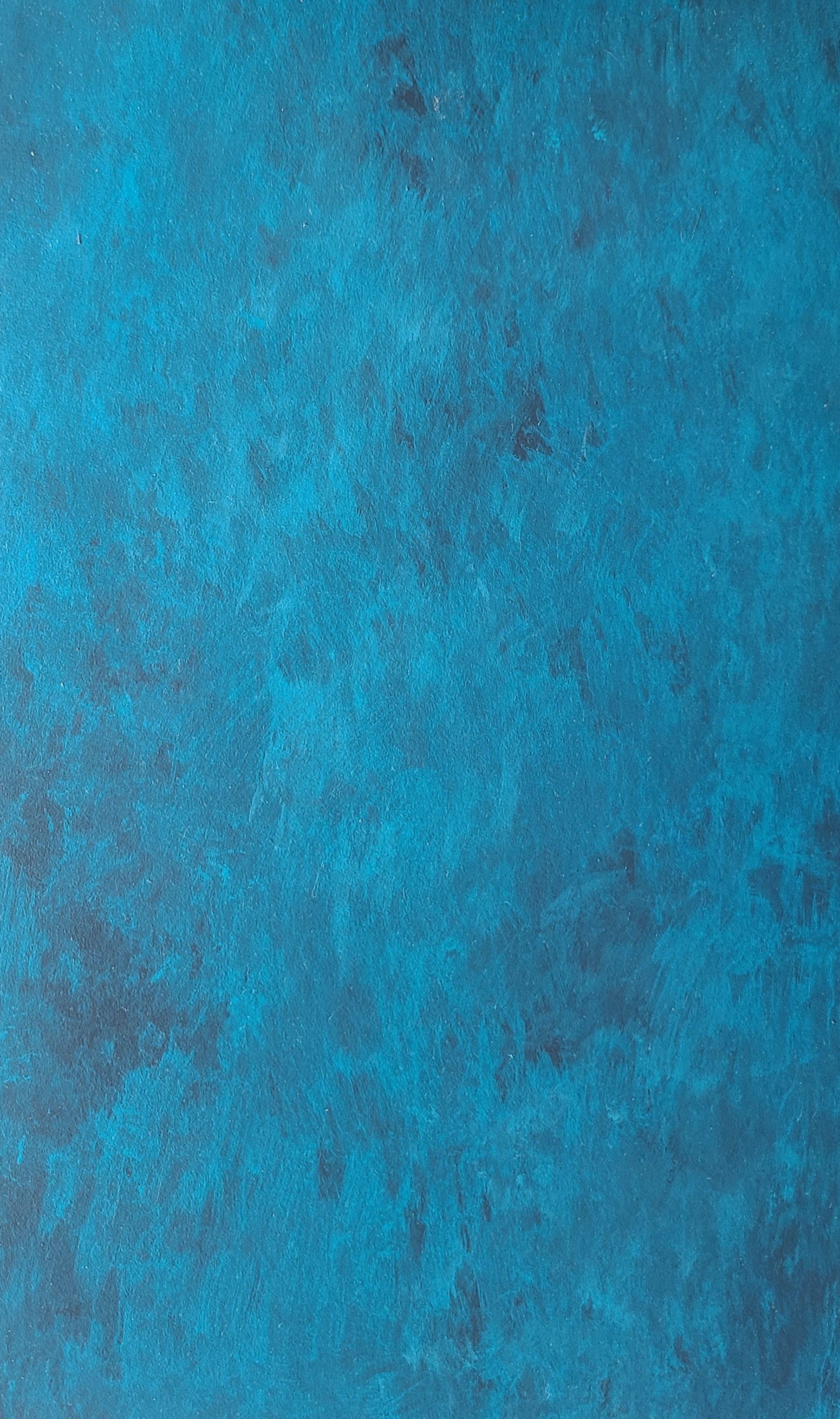 Textured teal blue background with dark mottled areas.