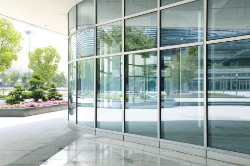 Modern glass building skyscrapers of business center - Tinting in Lake Villa, IL