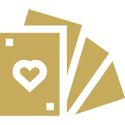 A stack of playing cards with a heart on them.