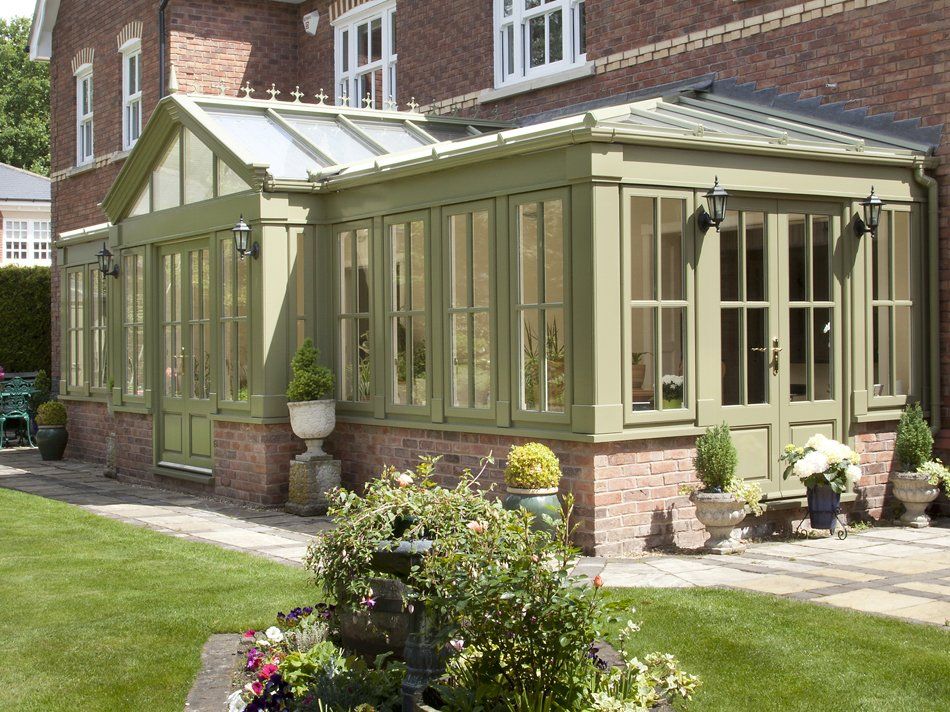 Green Colouored Home Conservatory Side View. Installed by Holts Orangeries.