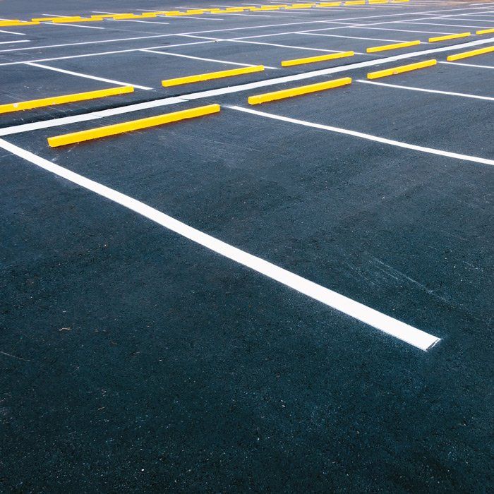 Concrete Bumper Blocks — Yellow Wheel Stops in Travares, FL Concrete Bumper Blocks — Yellow Wheel Stops in Travares, FL