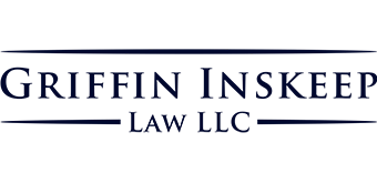 The logo for griffin inskeep law llc is blue and white.