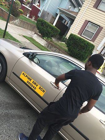 opening door of car - Driving School in Dumont ,NJ