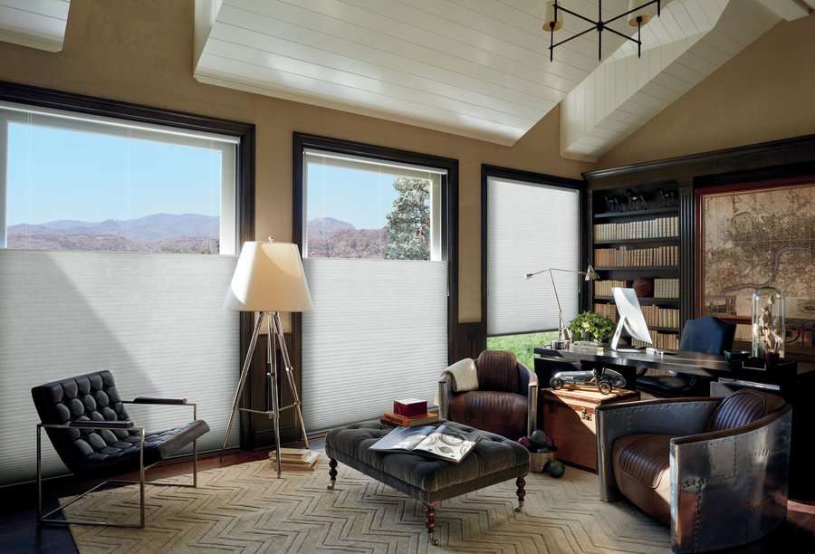 Home office with honeycomb shades installed