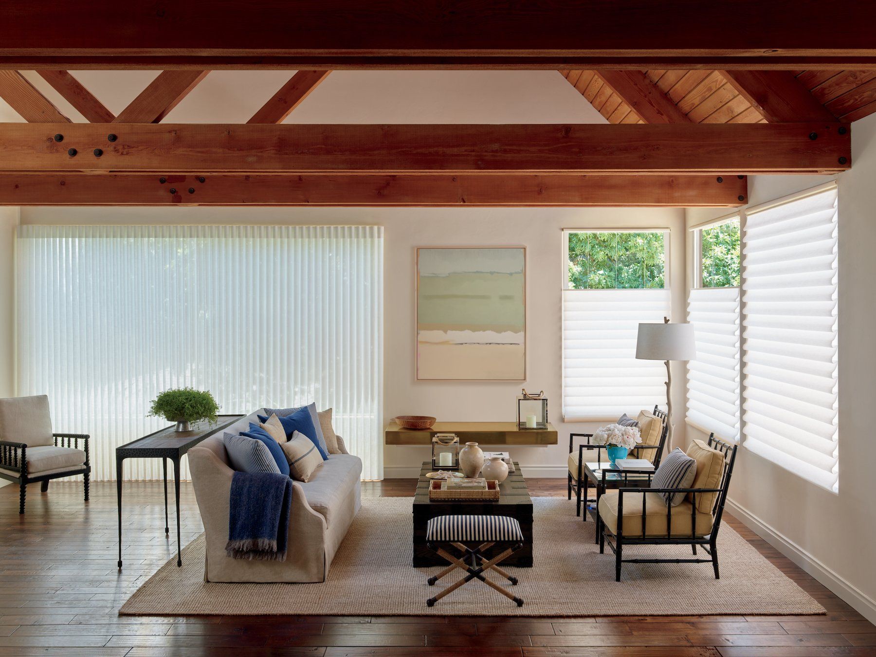 Living room in Auburn, WA with custom shades and vertical blinds