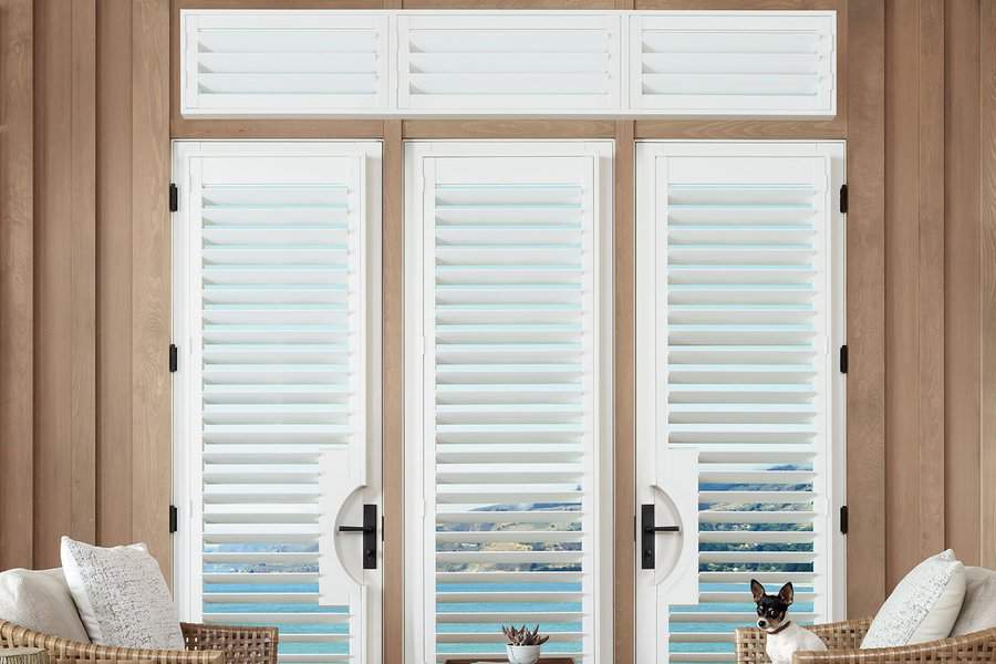 Glass door with Hunter Douglas Palm Beach Shutters