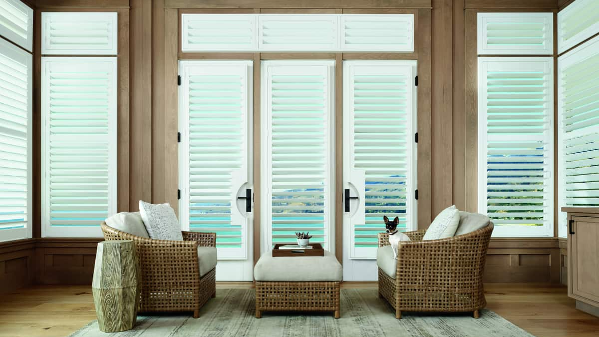 Motorized window treatments Palm Beach™ Polysatin™ Shutters on french door