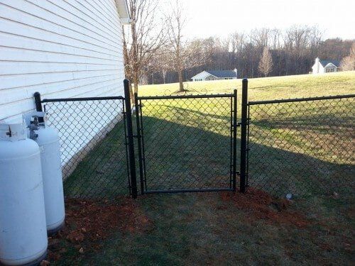Black chain-link fence and gate