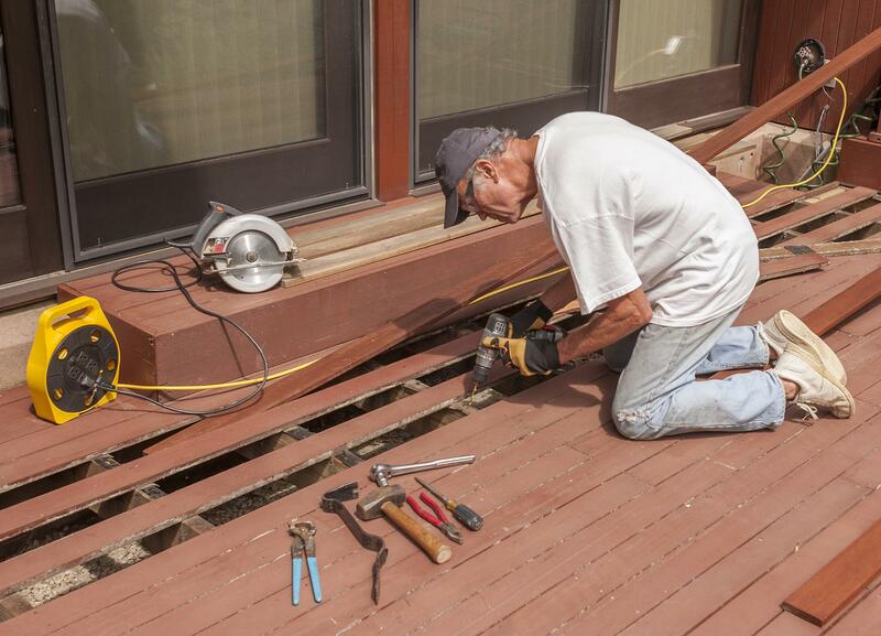 An expert repairing decks