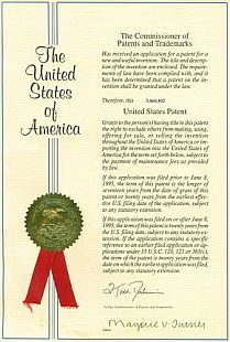 United States patent document with red ribbon and seal.