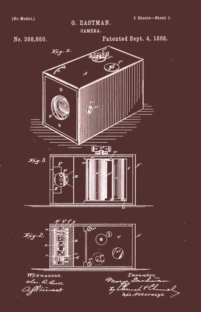 Patent illustration of a camera from 1883, with isometric, side, and top views.