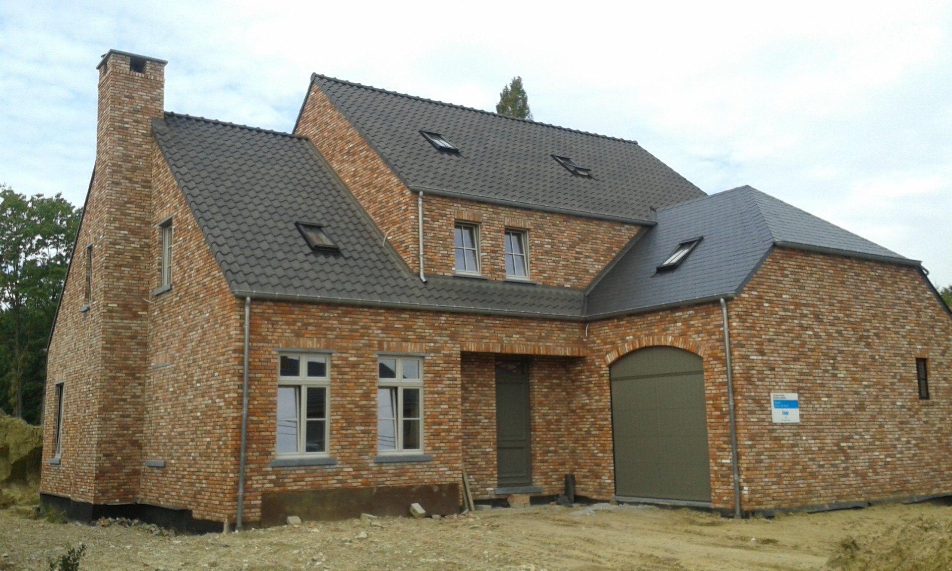 Nieuwbouw woning in landelijke stijl in Paal bij Beringen van architect Marjolein Janssens - Architectengroep Janssens
