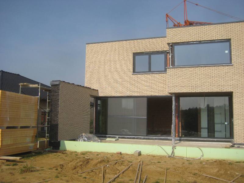 Moderne energiezuinige nieuwbouw in Assent Bekkevoort - werf2 - Architectengroep Janssens